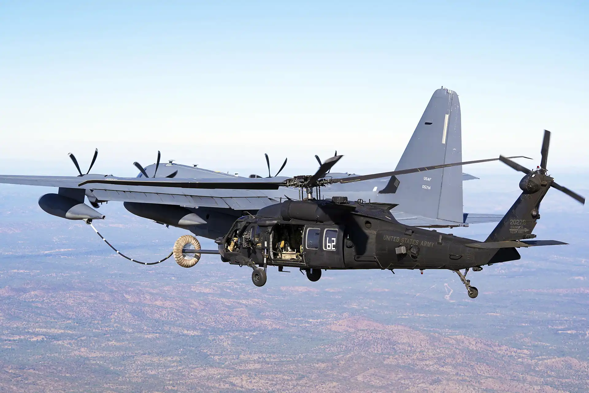 MC-130J Commando II refueling an MH-60 Black Hawk in flight