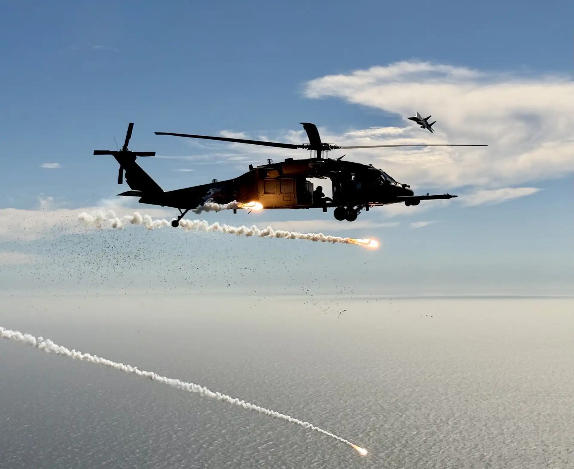 UH-60M Black Hawk deploying countermeasure flares